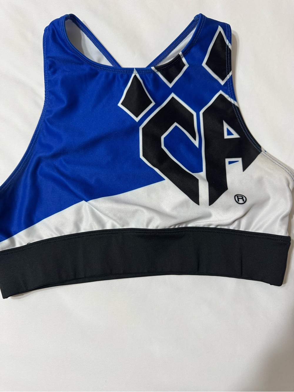 Cheer athletics blue and white sports bra adult medium rebel cheer